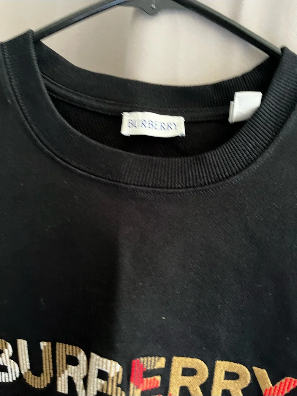 Burberry Black Logo Tee with Beige Plaid and Red Accents